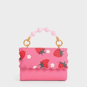 Charles & Keith Rowan Bead Handle Strawberry Print Wallet in Pink